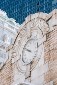 clock on old building in city